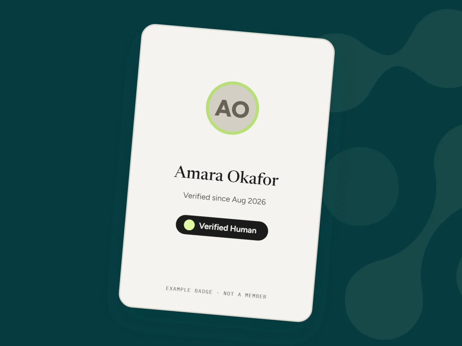 An example Fuzzy badge card on teal. Invented identity.
